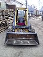 Фронтальный погрузчик New Holland Skidsteer 555 (3)