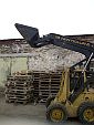 Фронтальный погрузчик New Holland Skidsteer 555 (4)