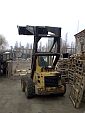 Фронтальный погрузчик New Holland Skidsteer 555 (5)